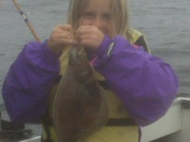 these are pictures of my daugther morgan the salmon was 32lbs out of trinidad ca same with the cabzone and rock fish she is 12 in that picture. 640x480 c